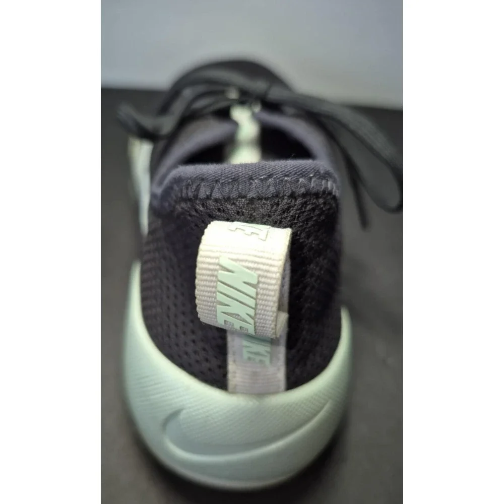Nike women's tennis shoe navy with seafoam green‎ swoosh logo sz 7.5 lightweight